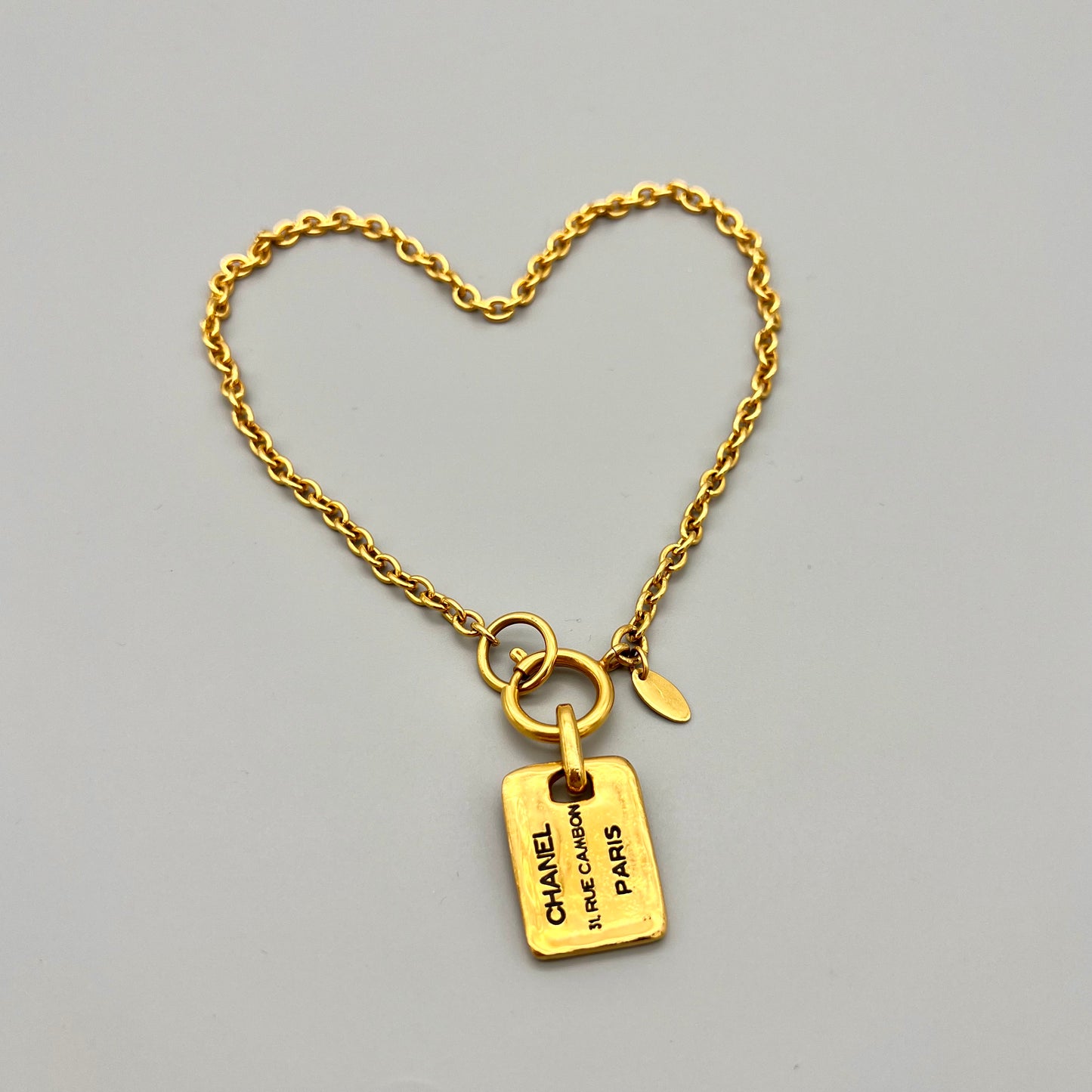 Afar Vintage Pre-owned CHANEL Cambon Line Tag Pendant Necklace