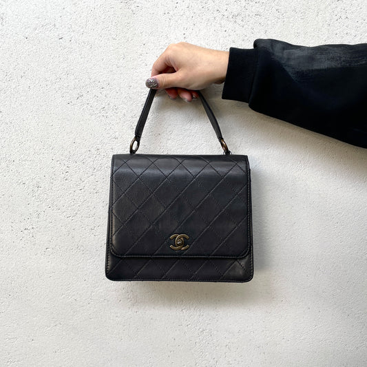 CHANEL Matelassé Kelly-Style Turn Lock Handbag